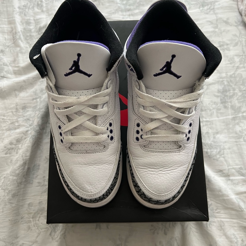 White and Black Sneakers with Purple Accents